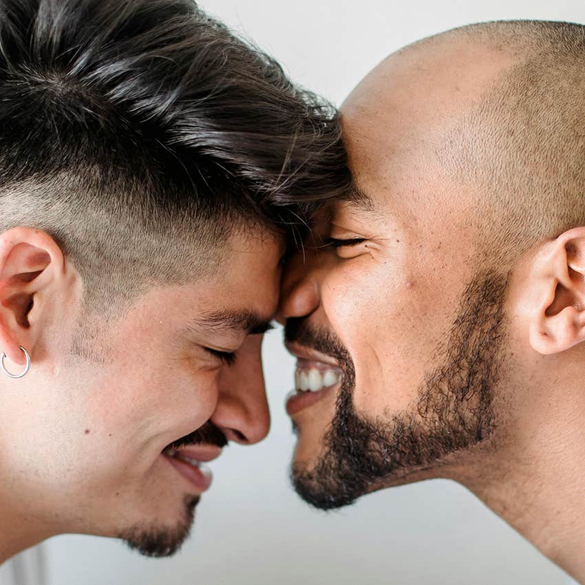 gay couple smiling together