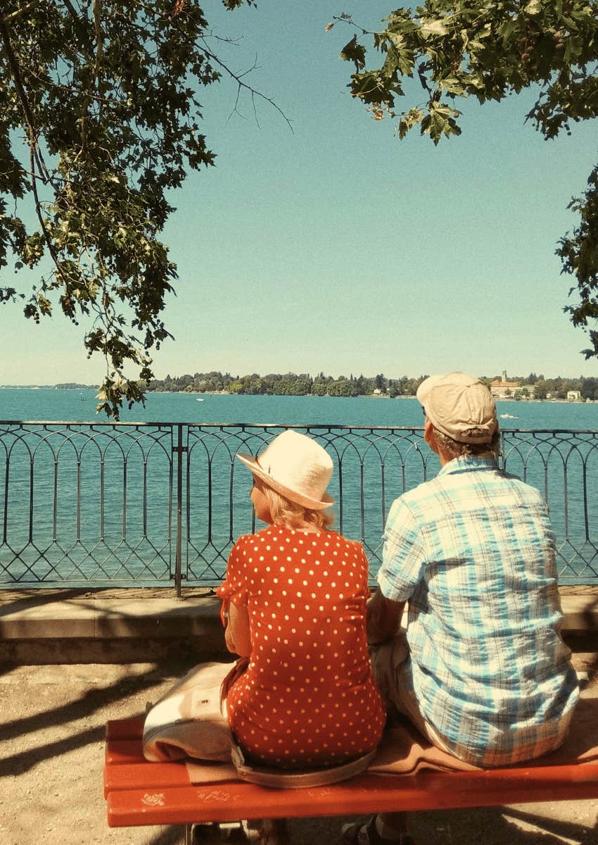 mature couple relaxing on outdoor bench