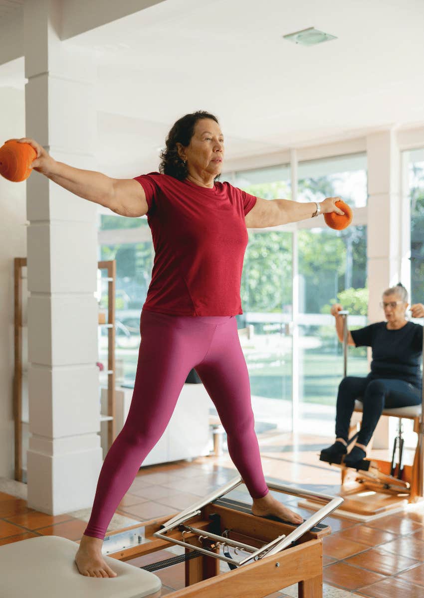 mature woman in a pilates studio