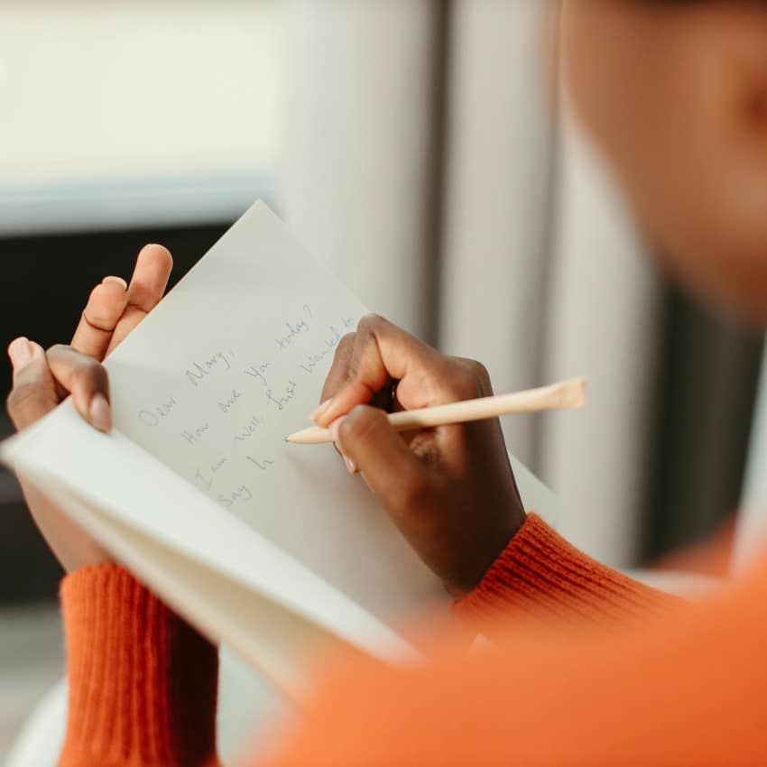 person revealing clues about their personality through their handwriting