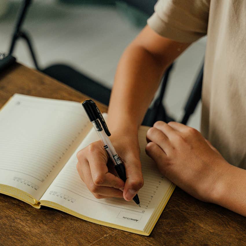 person doing identity work through journaling