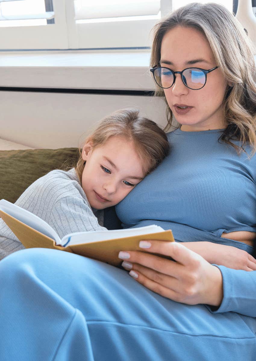 mom reading to her young child