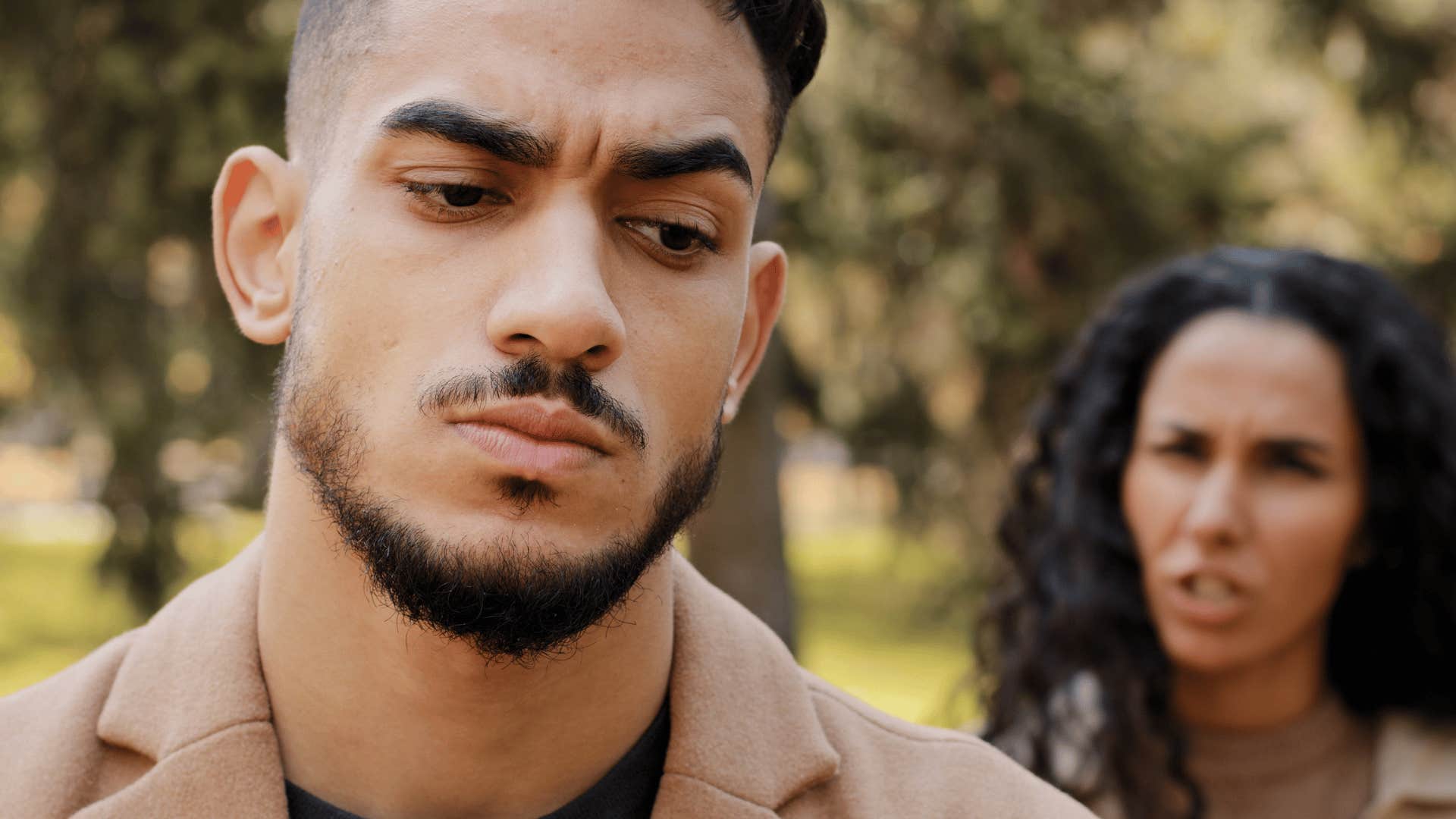 woman arguing with her partner about his friends seeming different