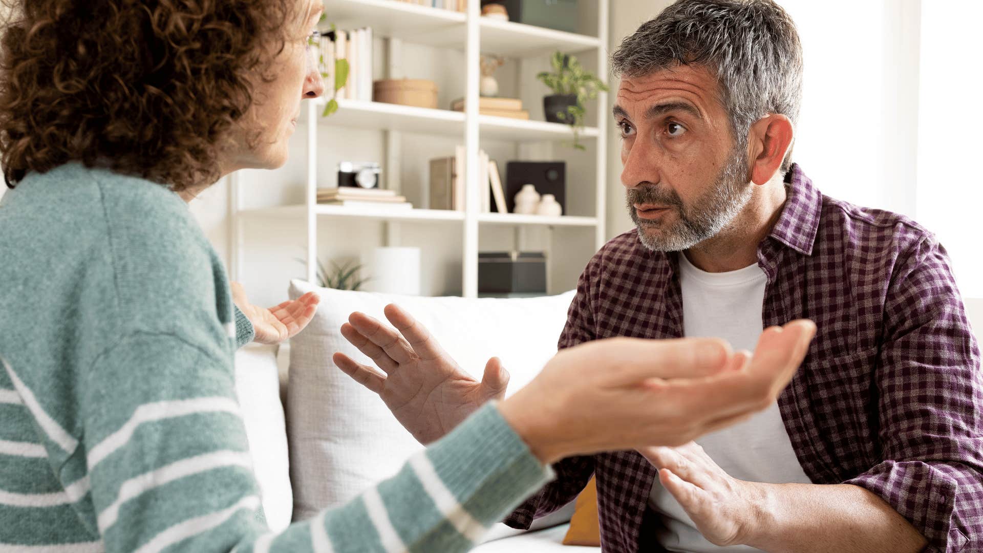 man who wants a divorce speaking directly with his partner