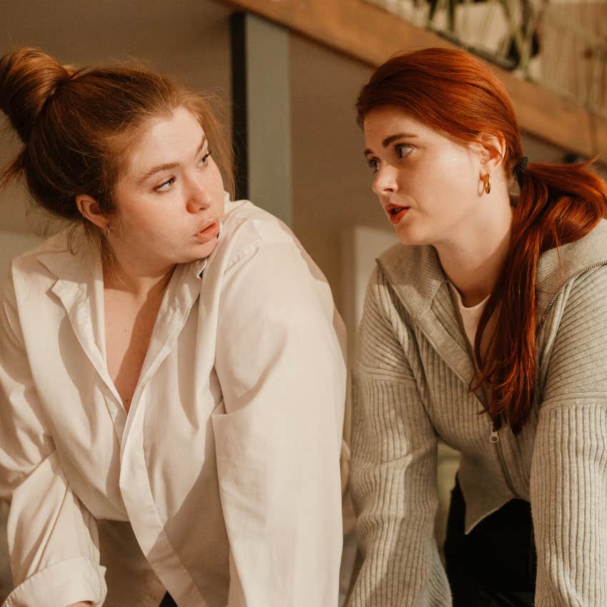narcissistic woman leaned in while her friend speaks