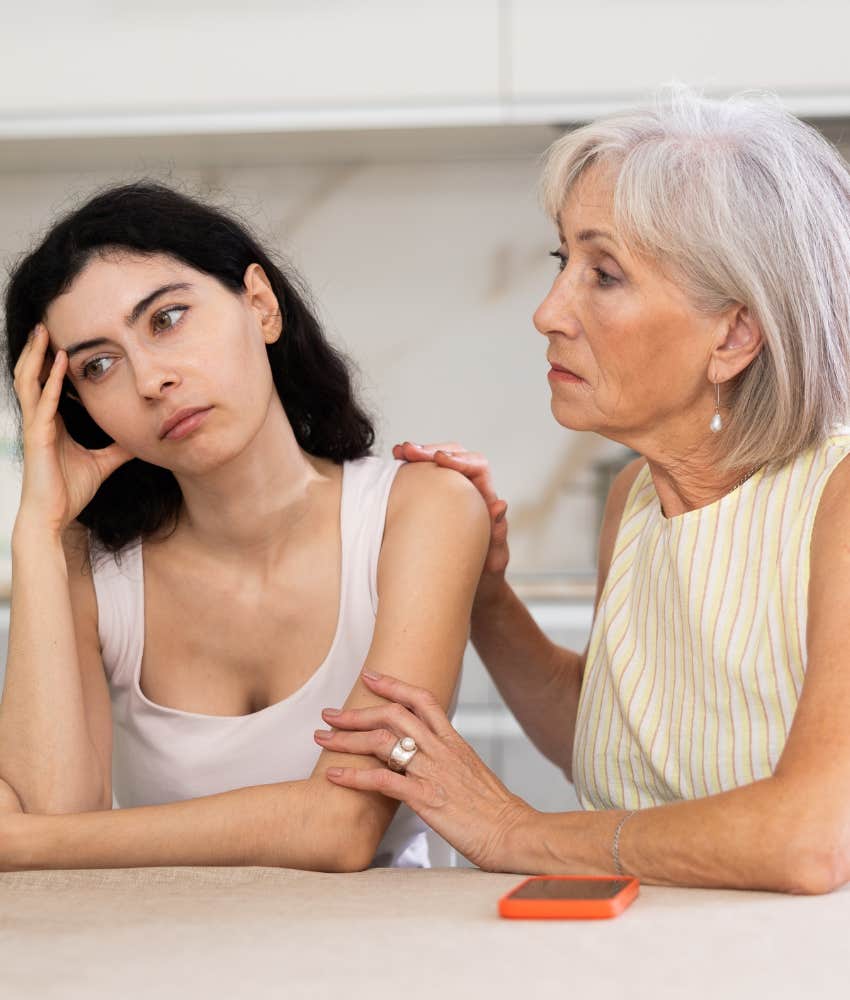 annoyed woman and elder mother showing parental resentment