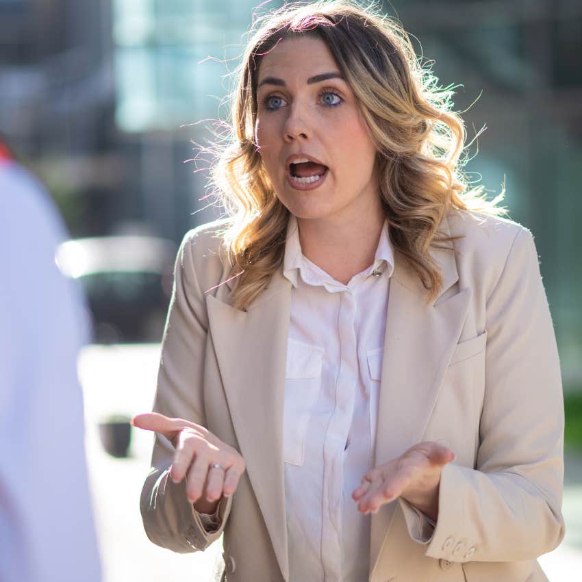 emotionally immature woman yelling at someone pretending to appeal to higher standards