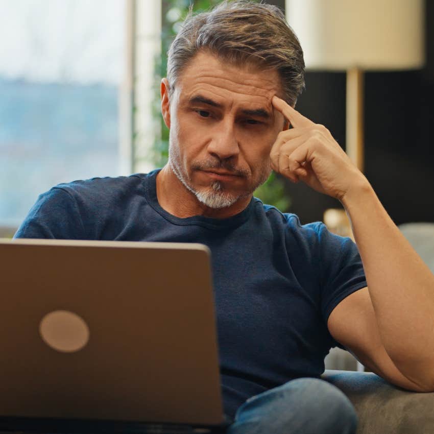 baby boomer adapting to change looking at laptop