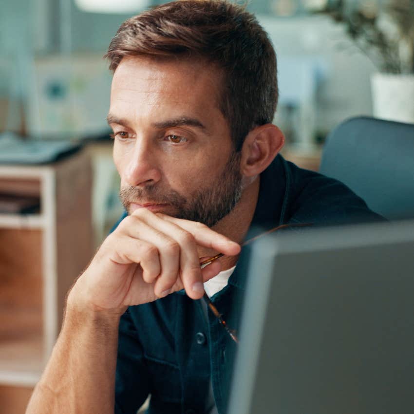 millennial man working not concerned with climbing the corporate ladder