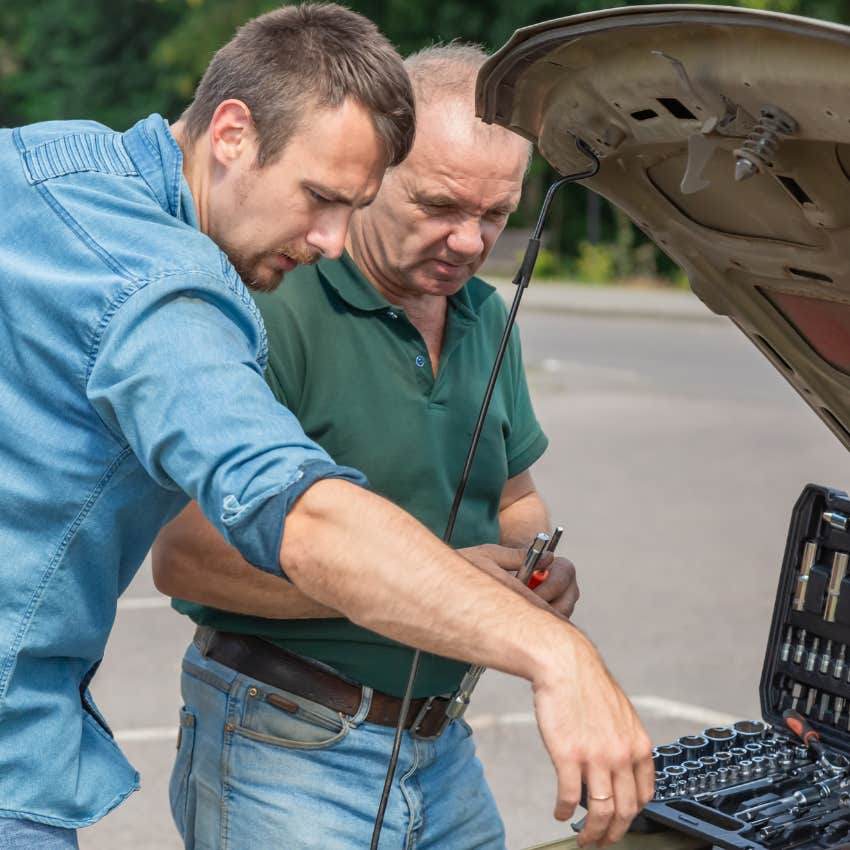 Man who fixes things before replacing them looking at his car