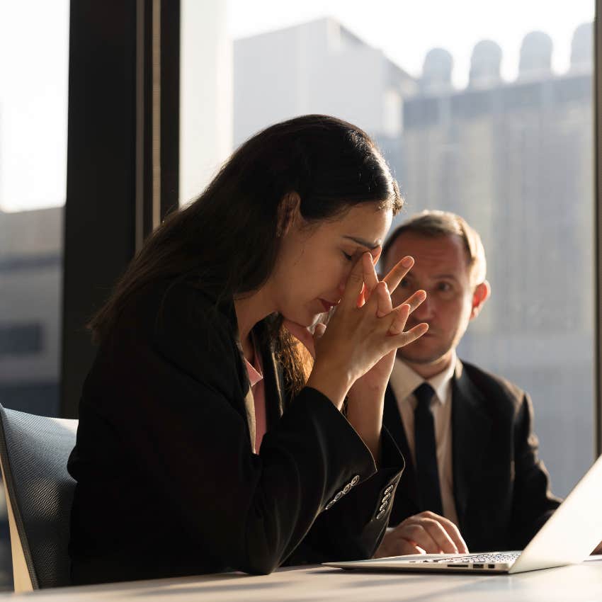 woman stressed out by her soul-sucking job has toxic spending habits