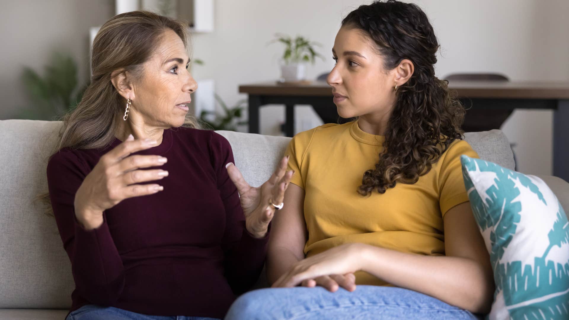 Woman getting support from parents at home.