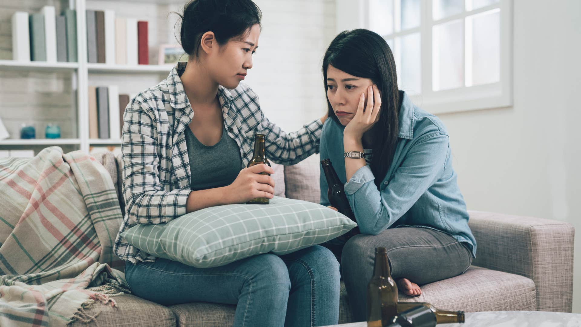 woman offering comfort to upset friend