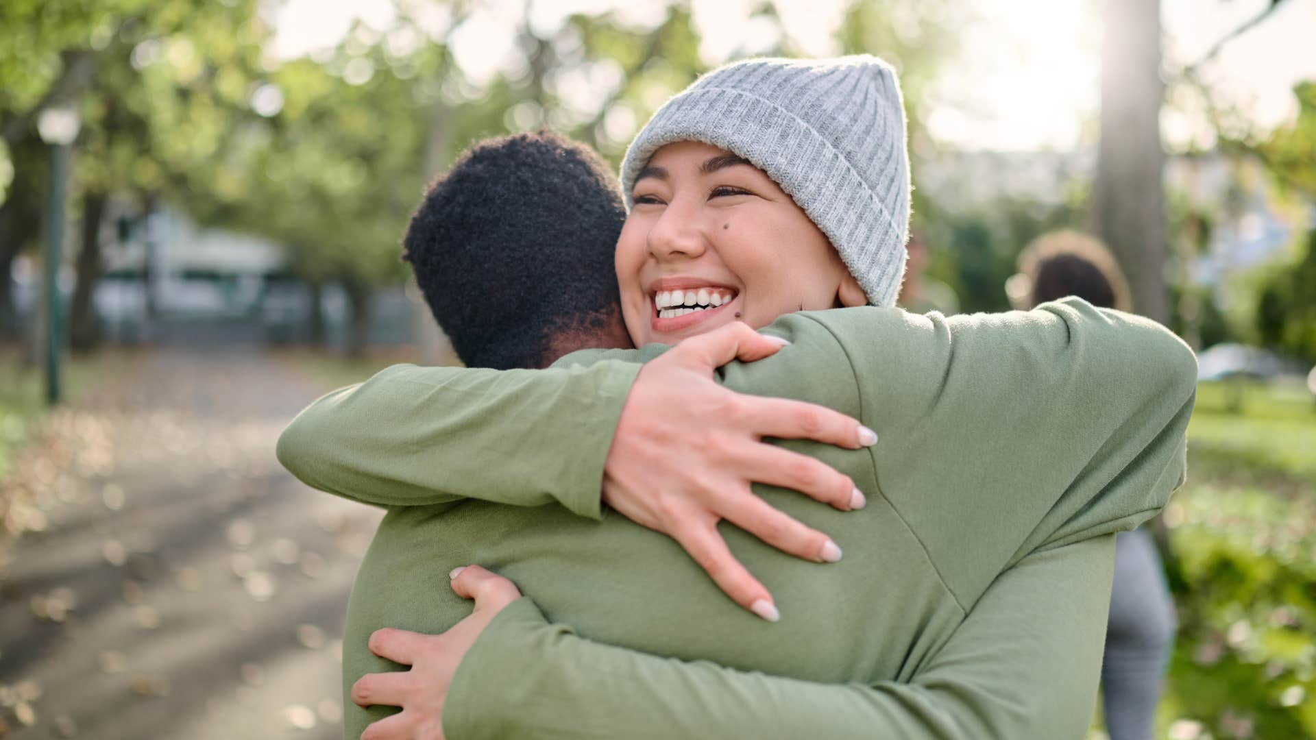 woman hugging friend