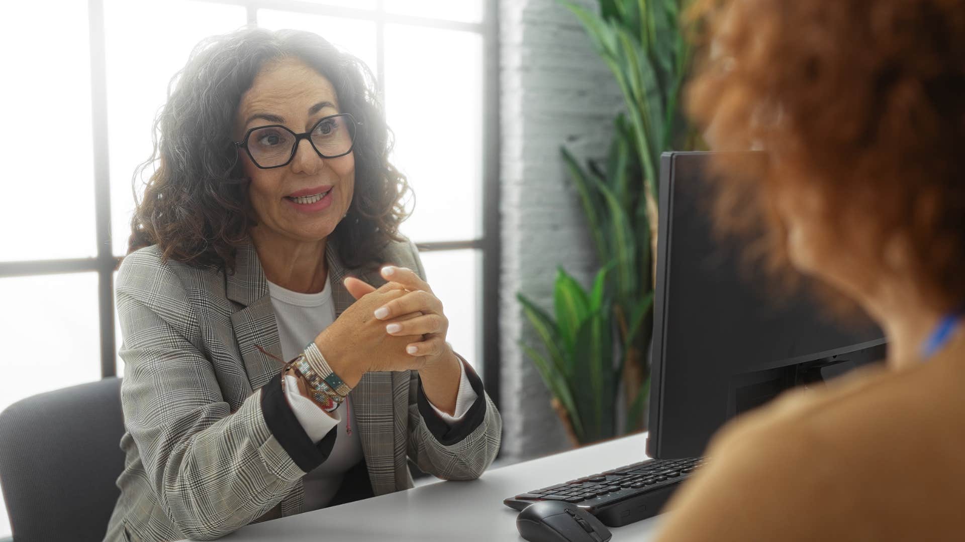 woman coming across as too polished talking to colleague