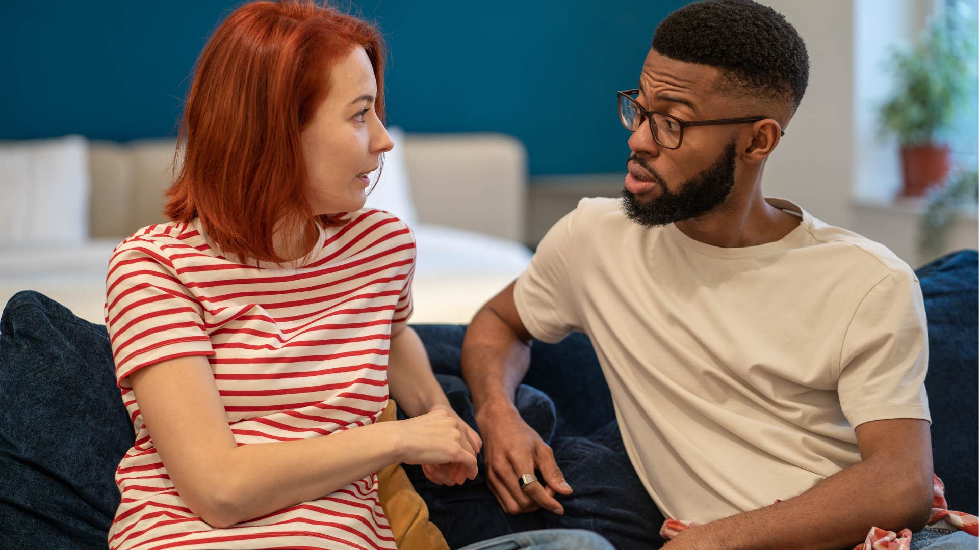 woman noticing her husband is over-explaining during conversation