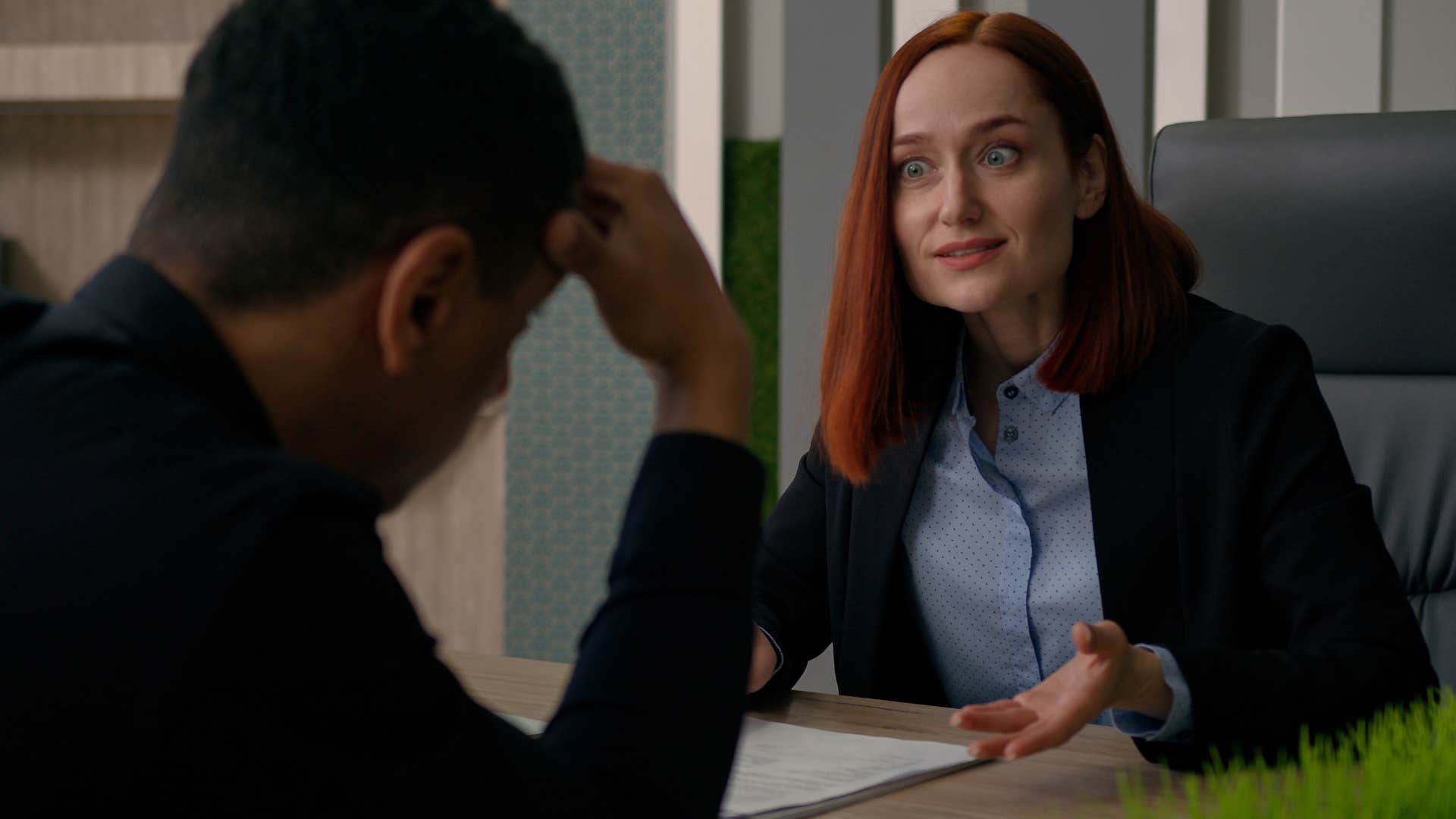 woman with a built-in lie detector noticing colleague pausing before responding