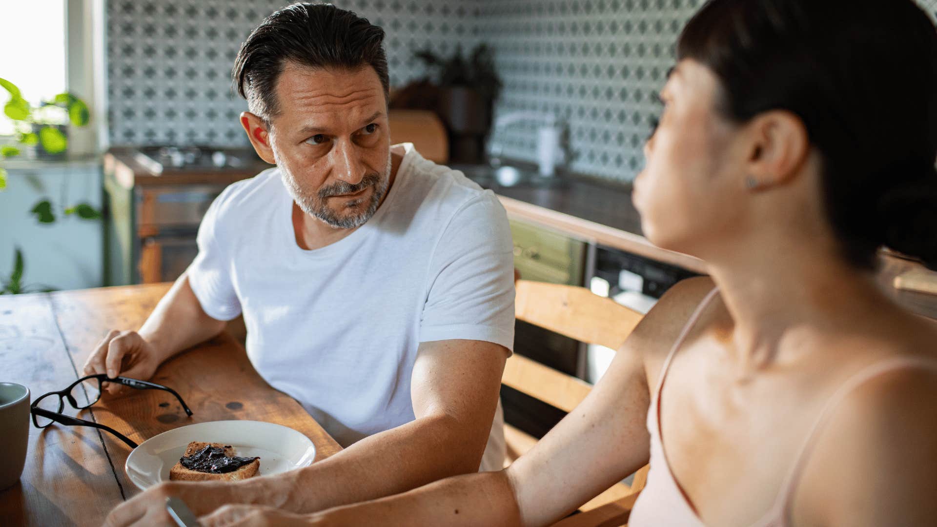 awkward man asking his partner what did you say