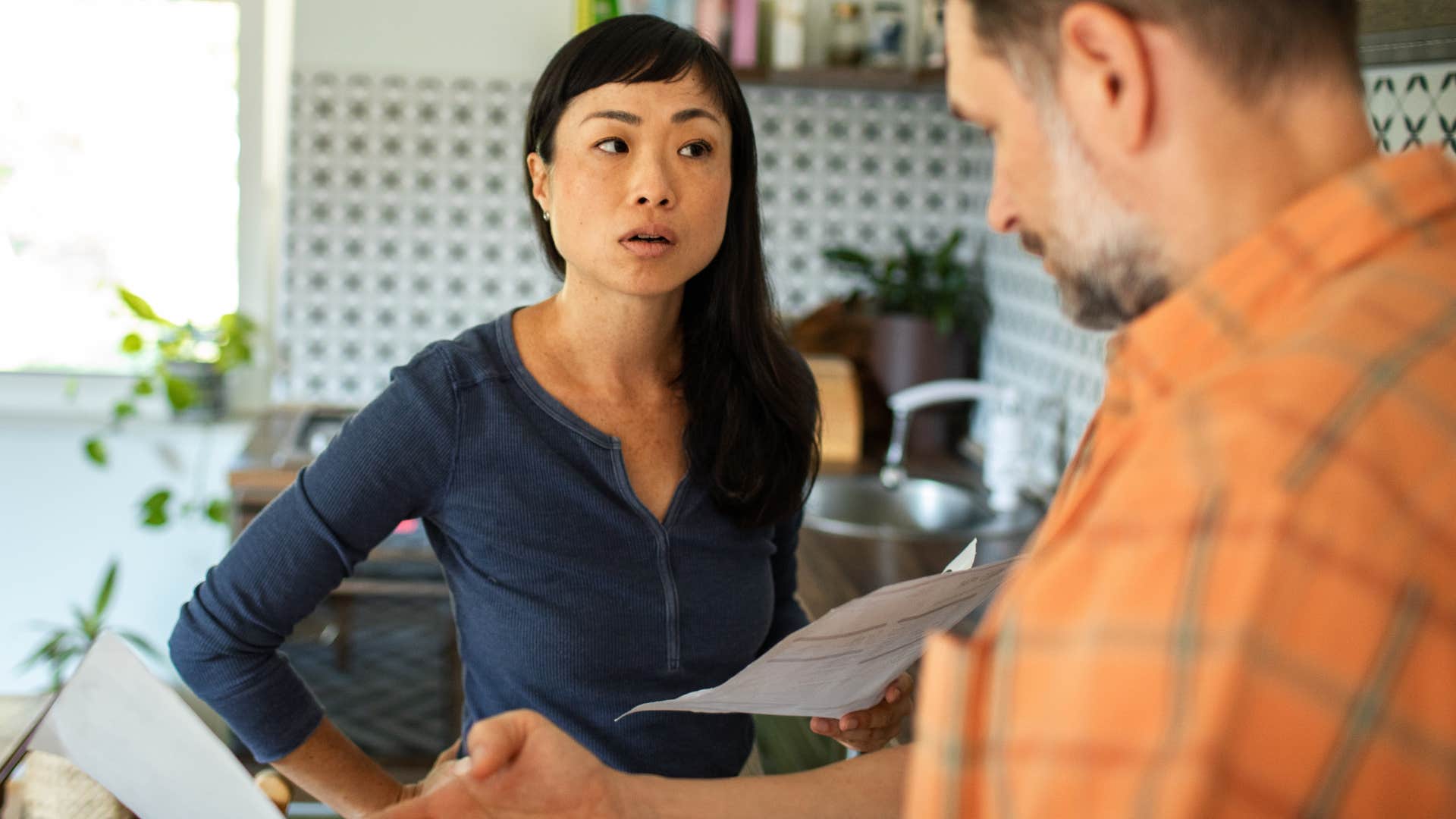 Woman saying "I don't want to talk about that" to her partner.