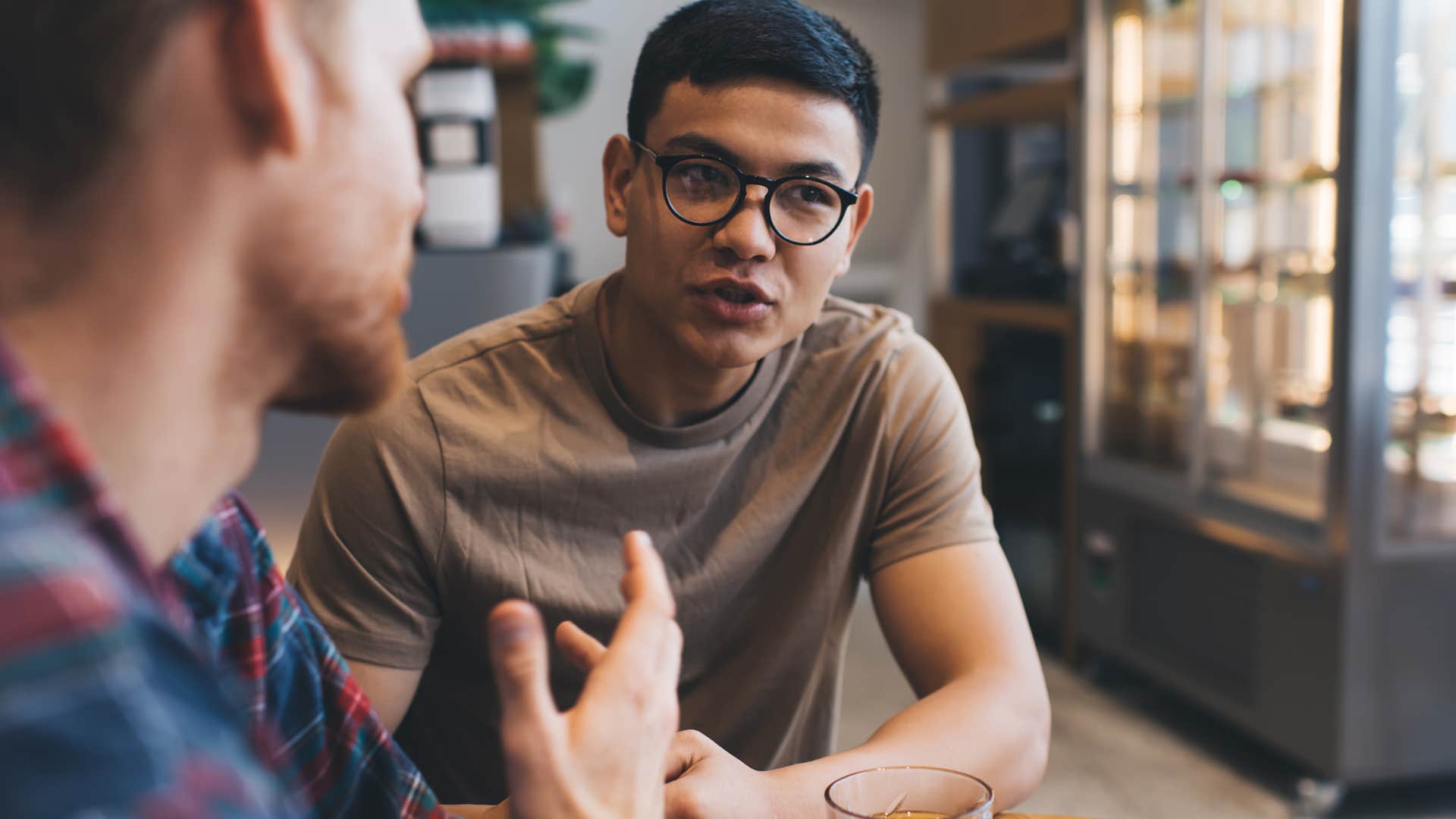 Man with a high IQ making conversation awkward by saying technically speaking