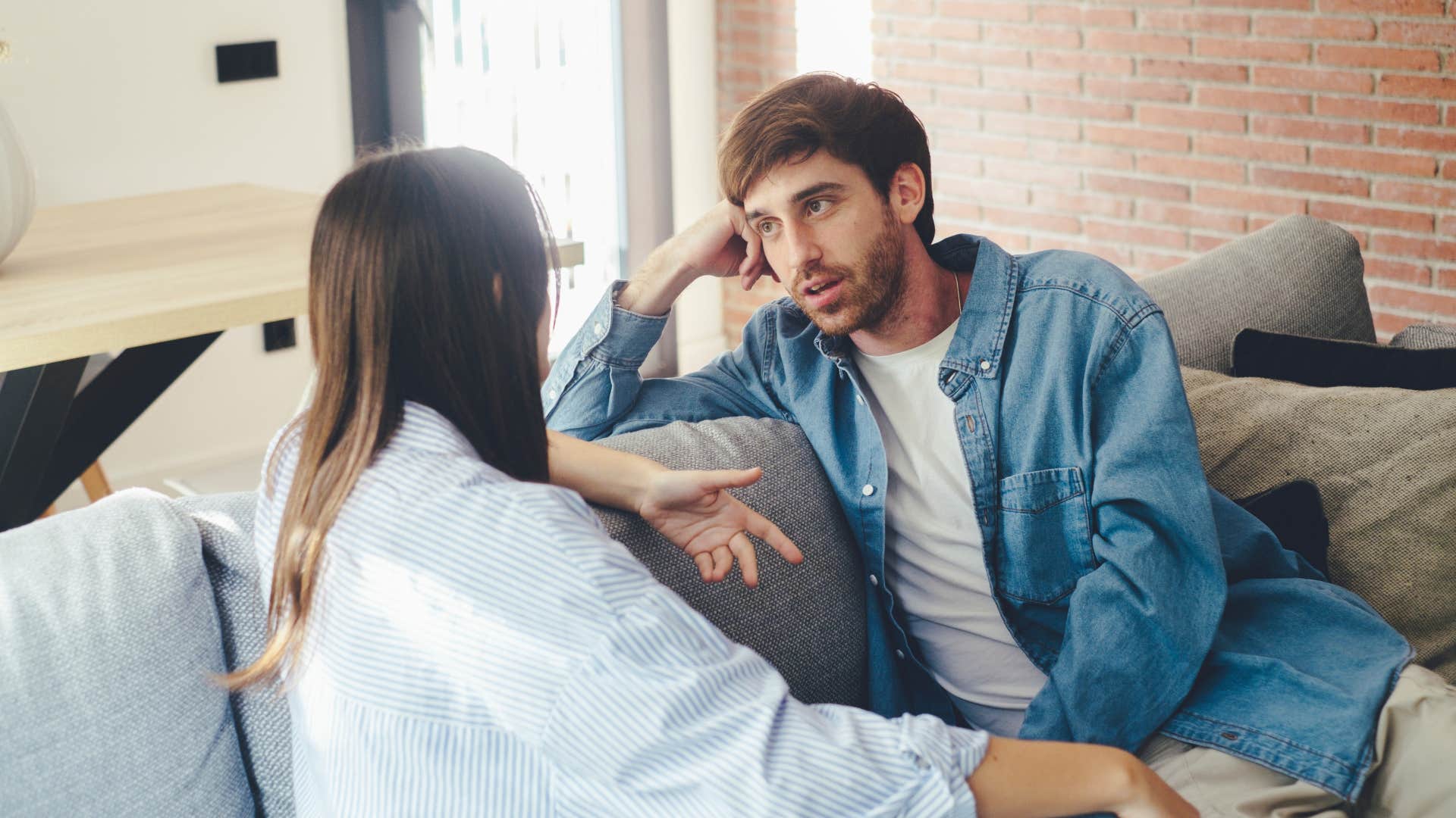couple on the couch talking man saying you deserve better