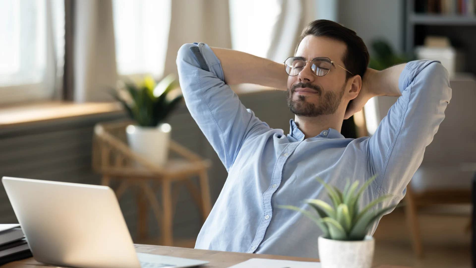 relaxed man at work listening to his gut instincts