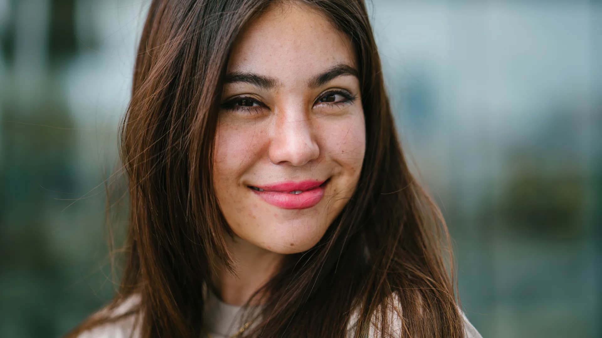 happy woman with a high iq and humble mindset