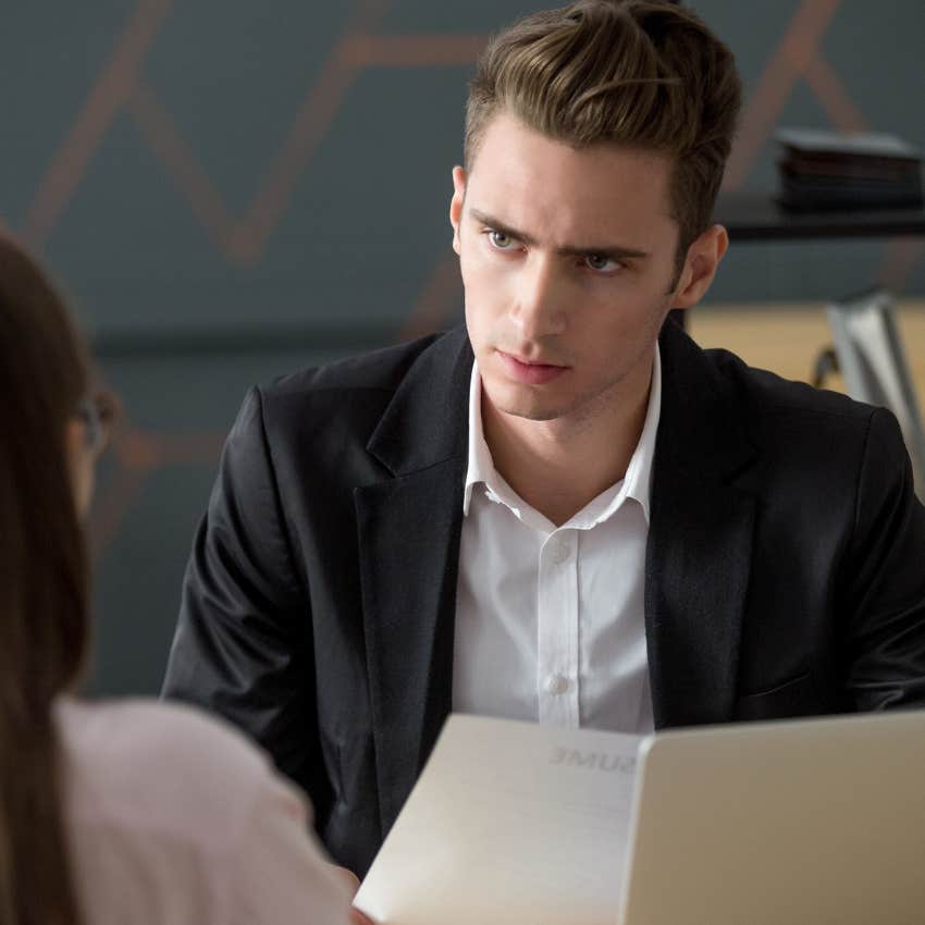 man pretending to be overconfident at work