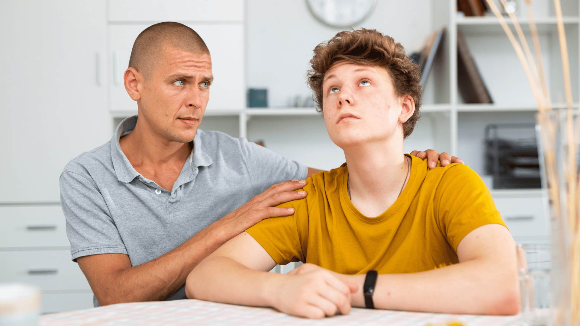 good dad teaching his son how to work through his struggles