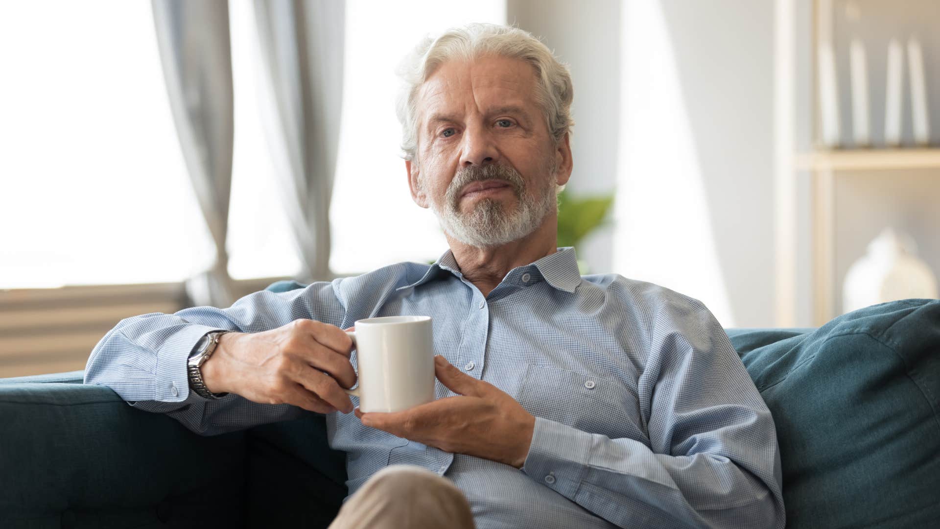 man looking confident and happy after forgiving himself
