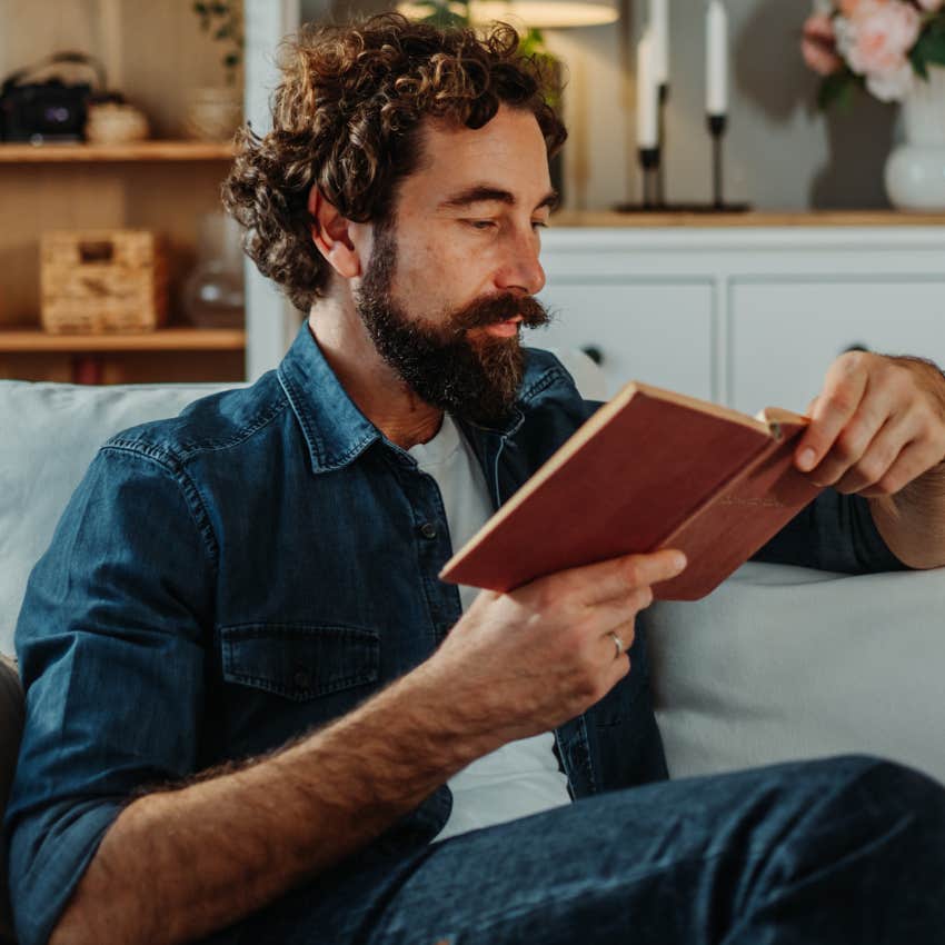 Man who can disconnect from phones reading a book at home