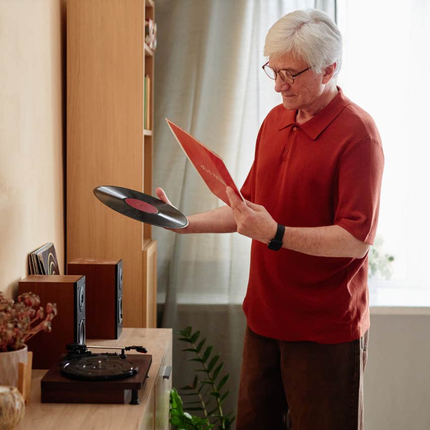 older man listening to records because today's music is only getting worse