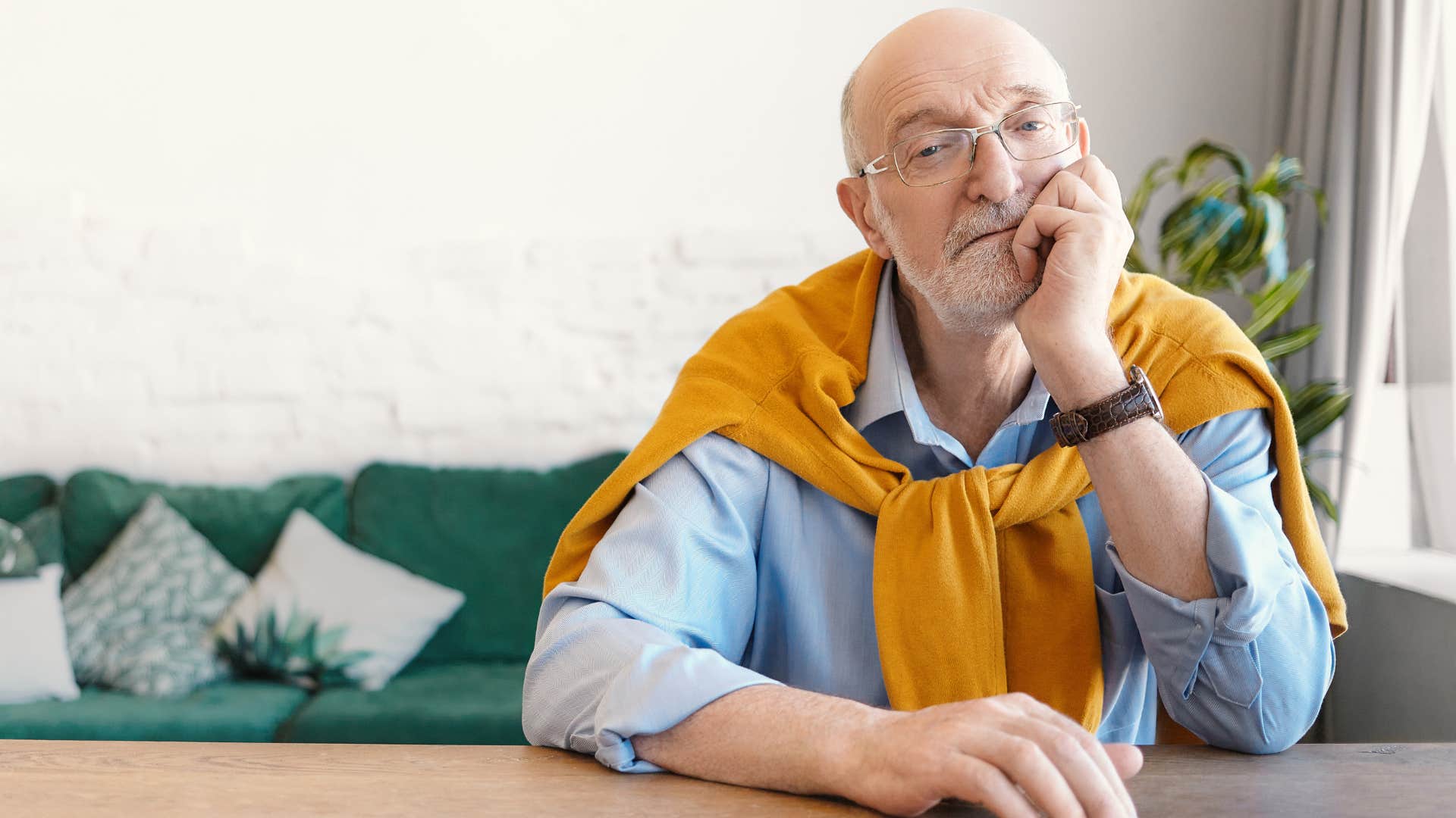 retired man feeling lonely and unfulfilled at home