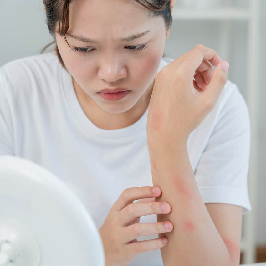 woman breaking out into hives at the thought of going to work