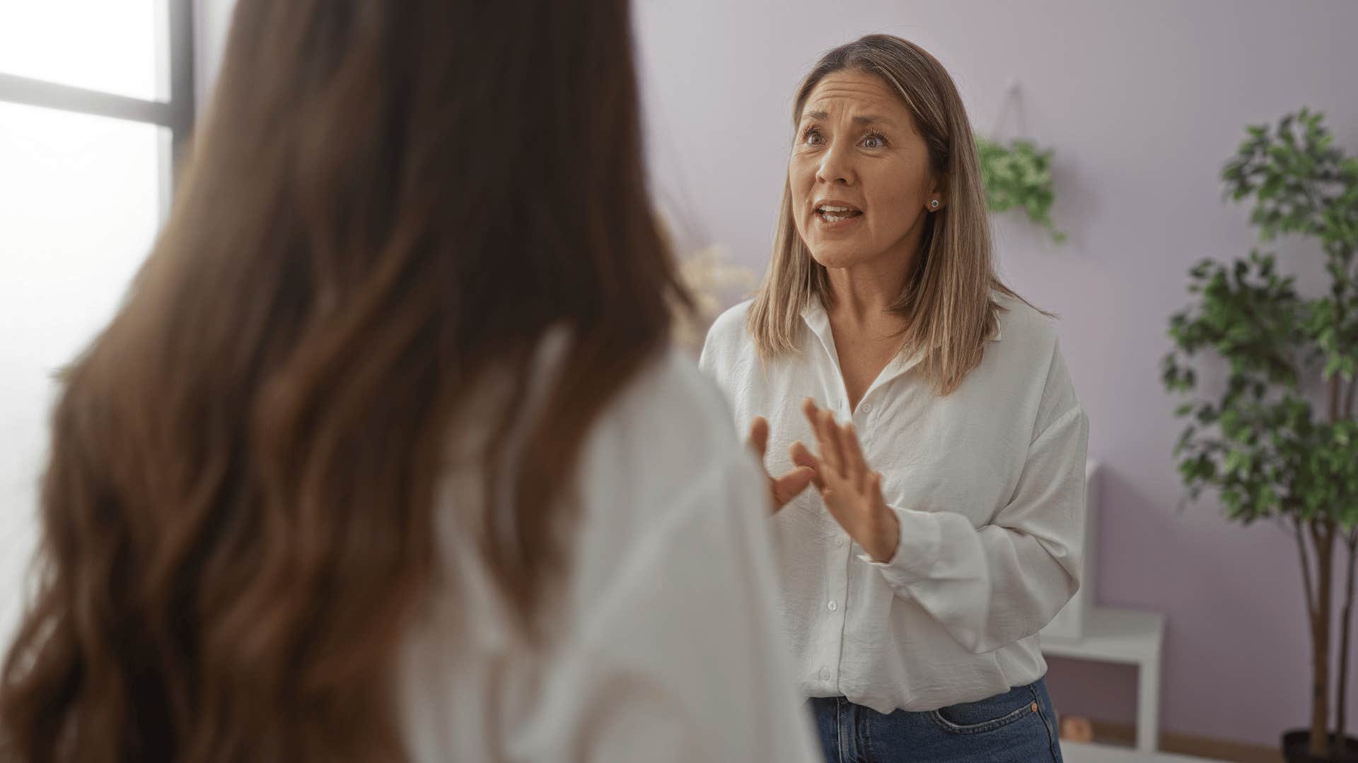 mom arguing with daughter minimizing her success