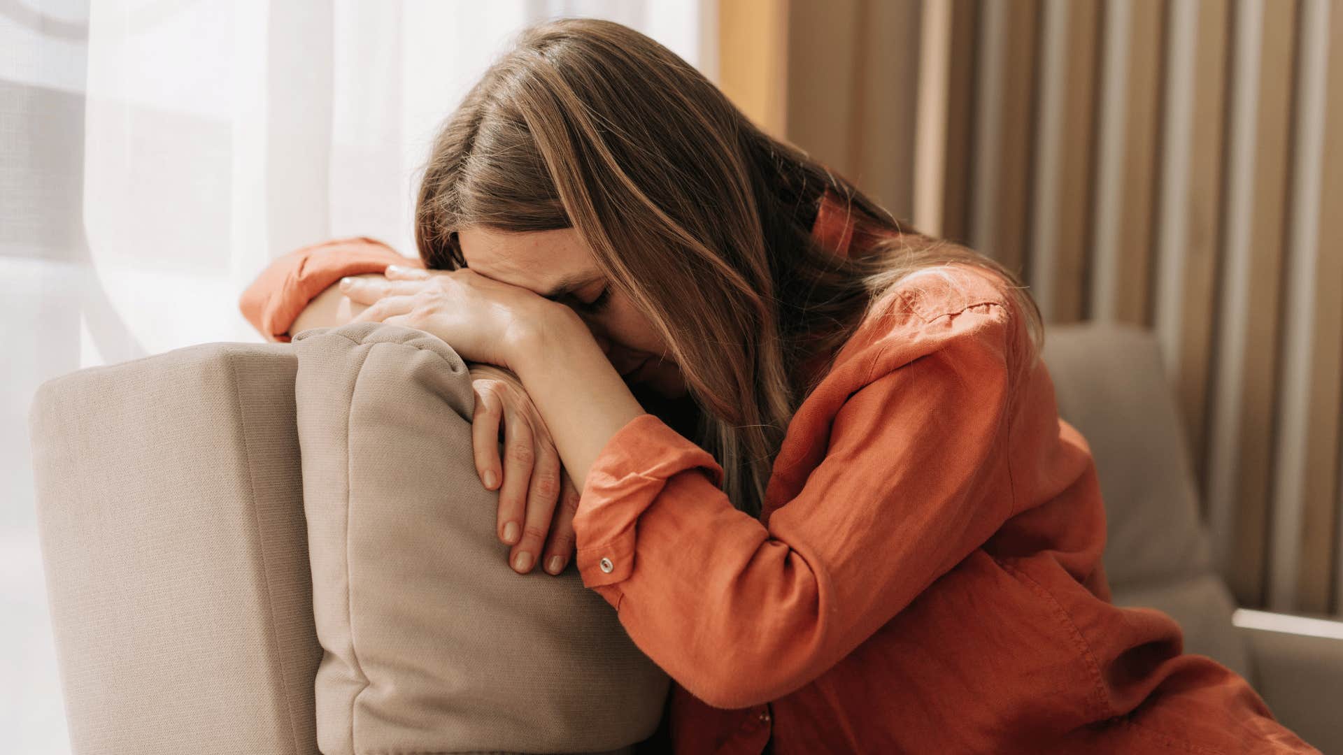 woman feeling drained after interacting with her mother