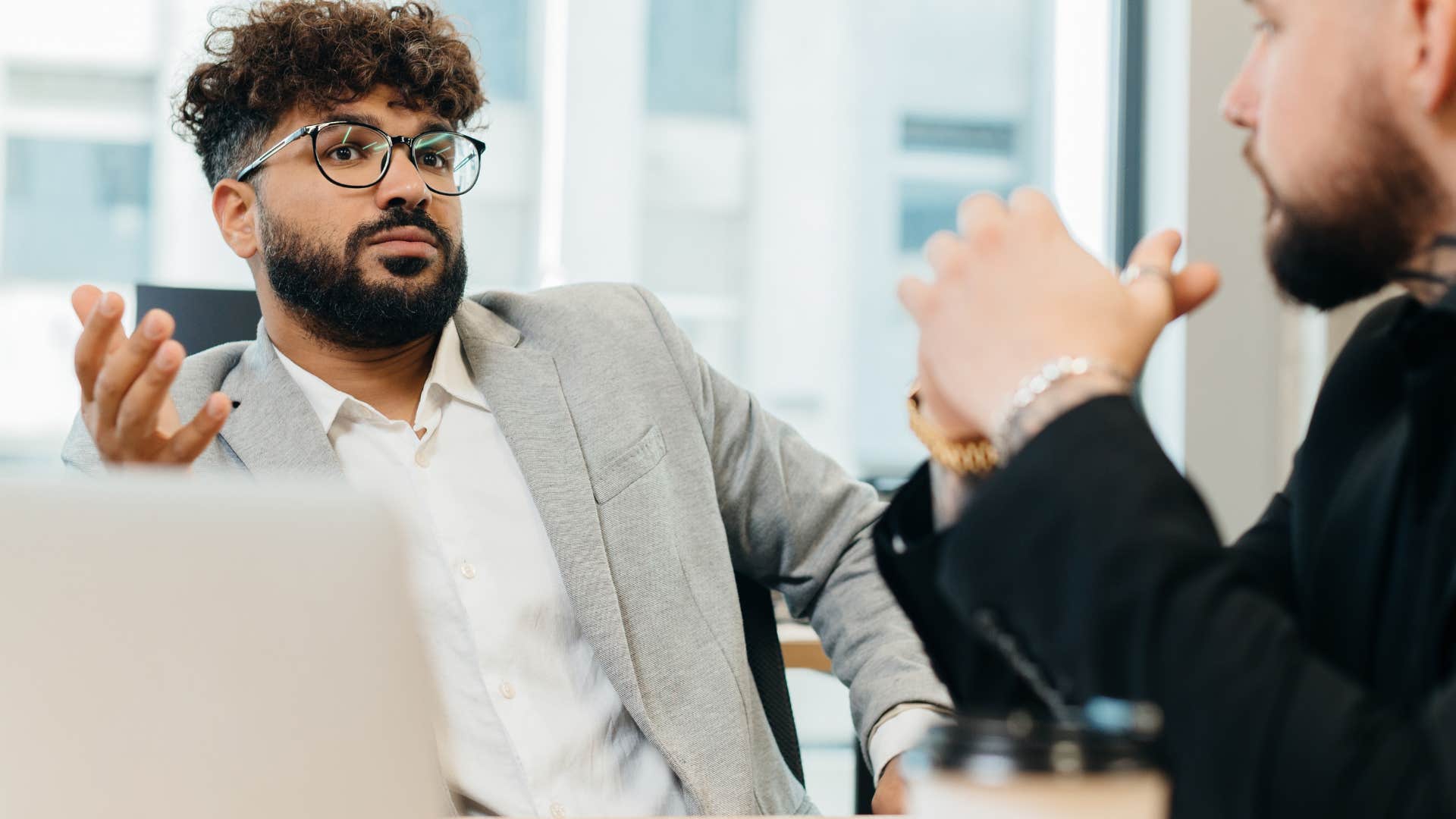 man staying calm in chaotic situations at work