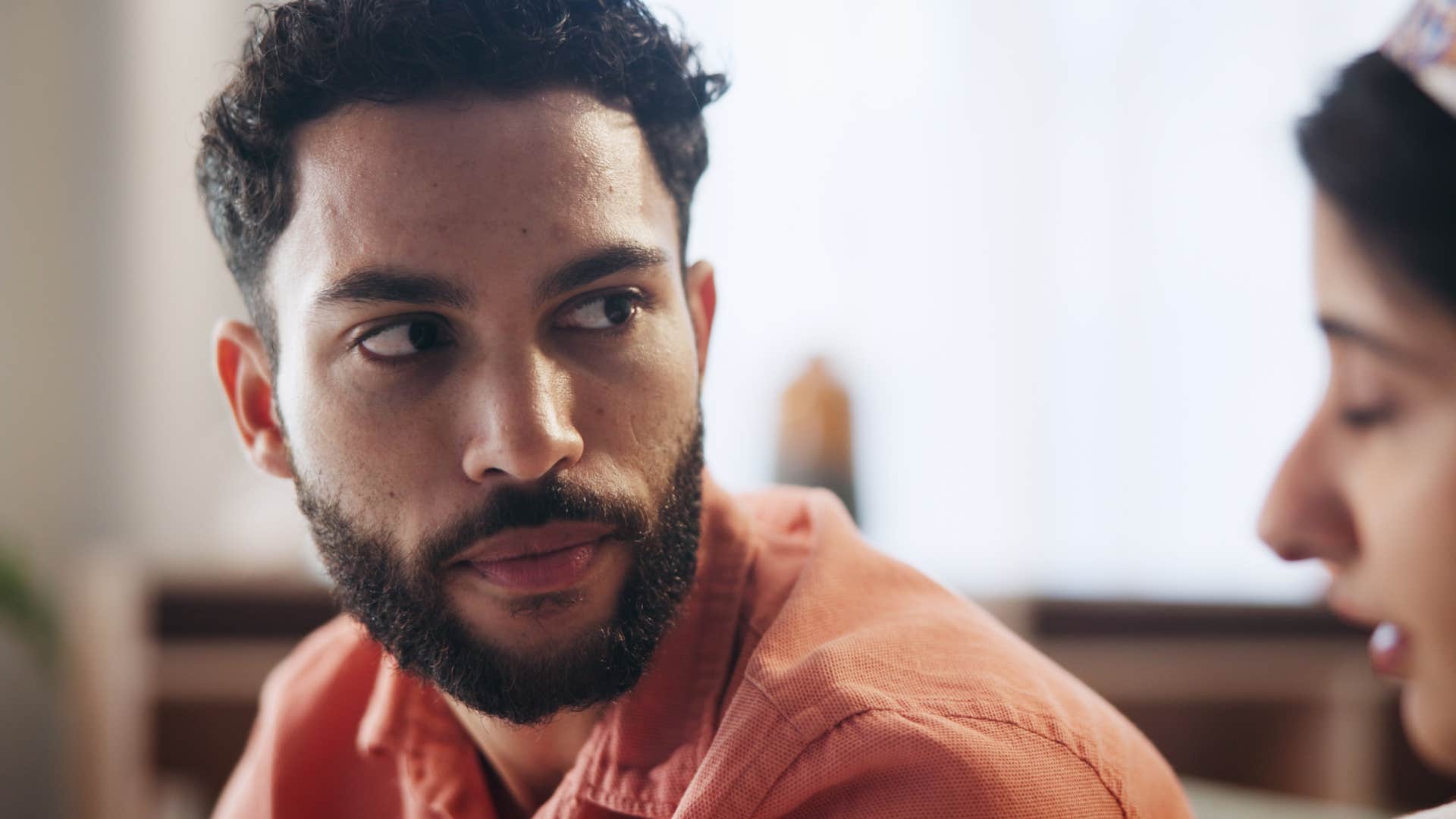 man with traumatic intelligence who rarely lets his guard slip talking to wife
