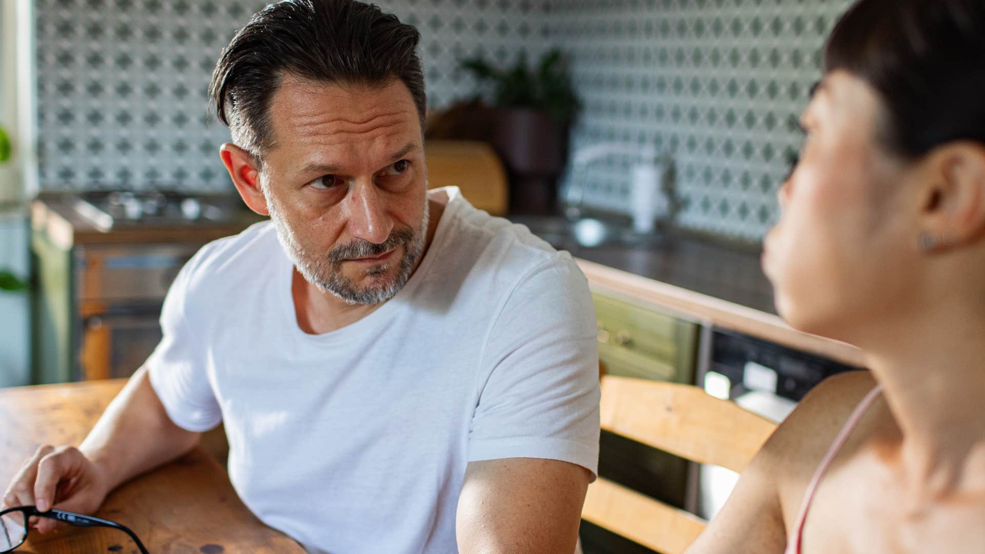 man with traumatic intelligence sensing manipulation from his partner