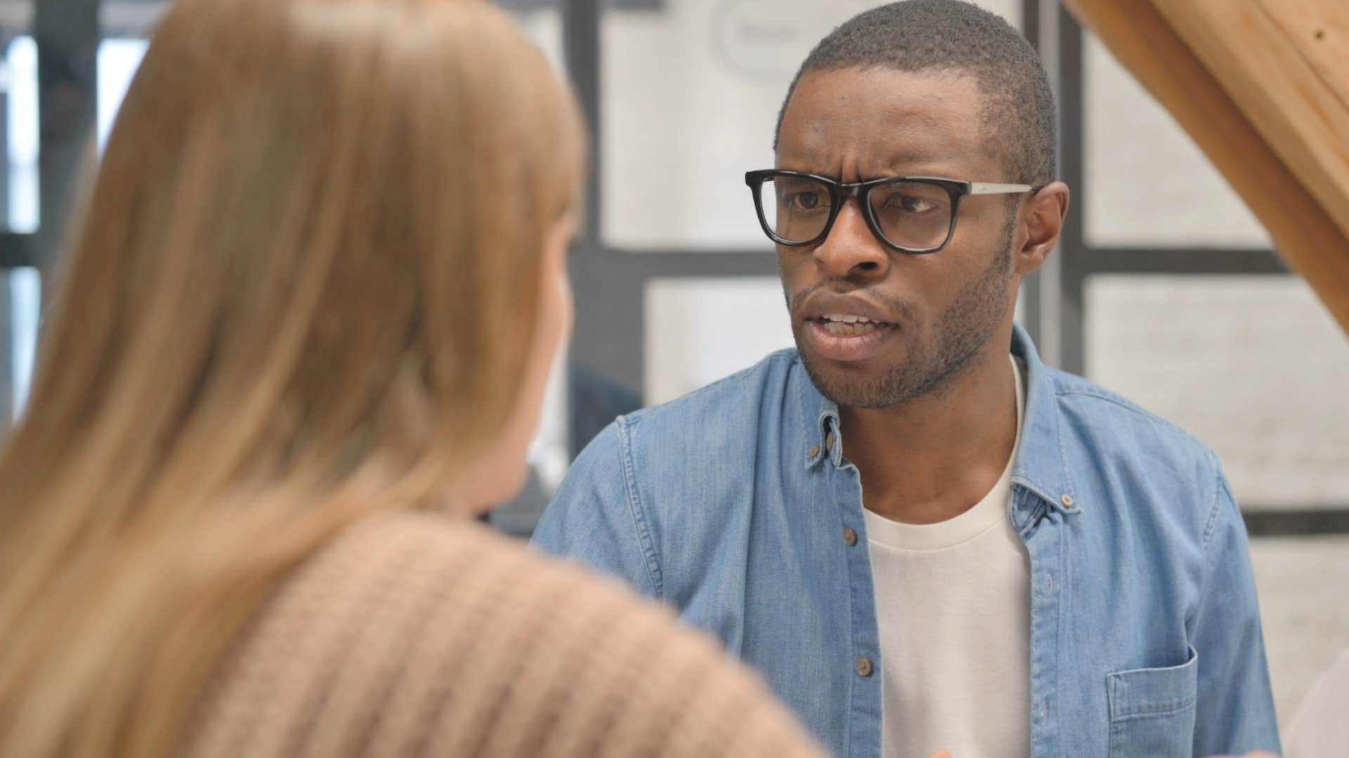man with strong boundaries talking with his colleague