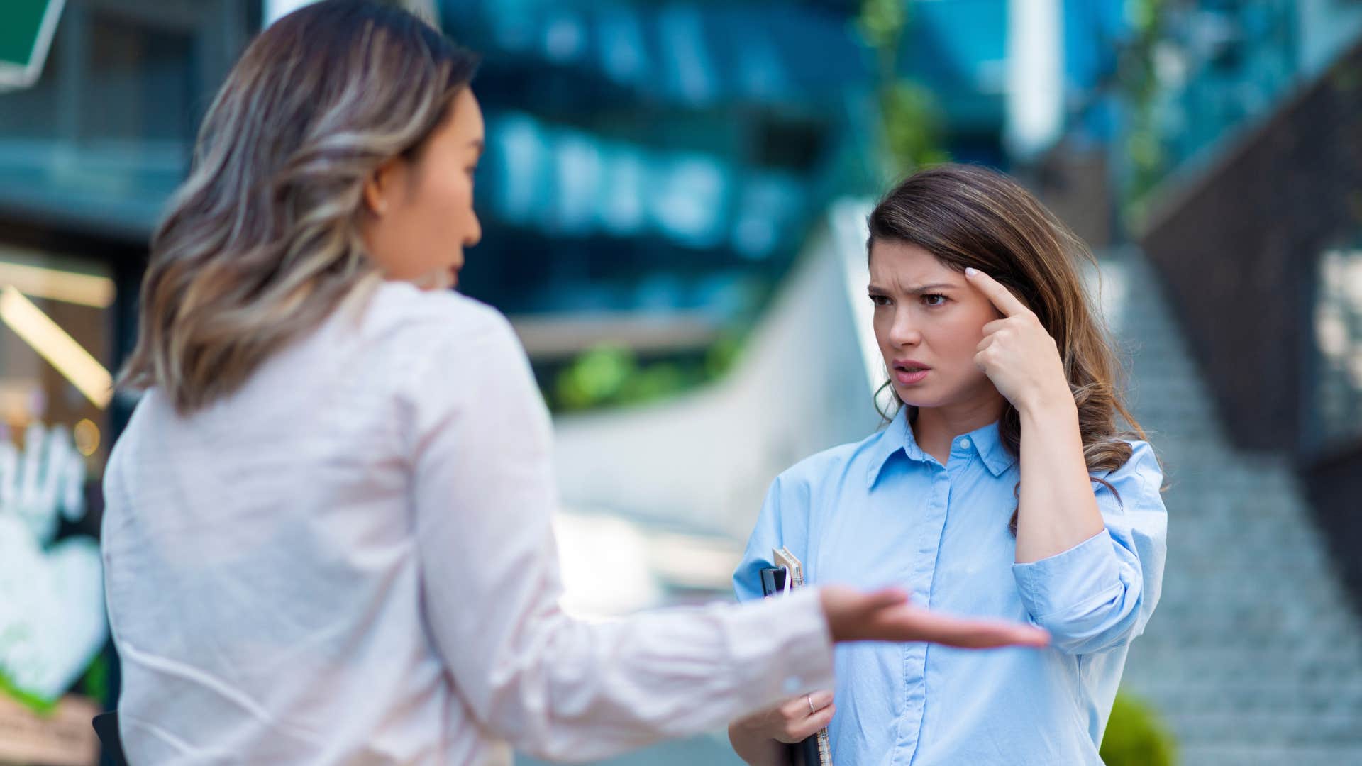 woman in competition with her friend during argument