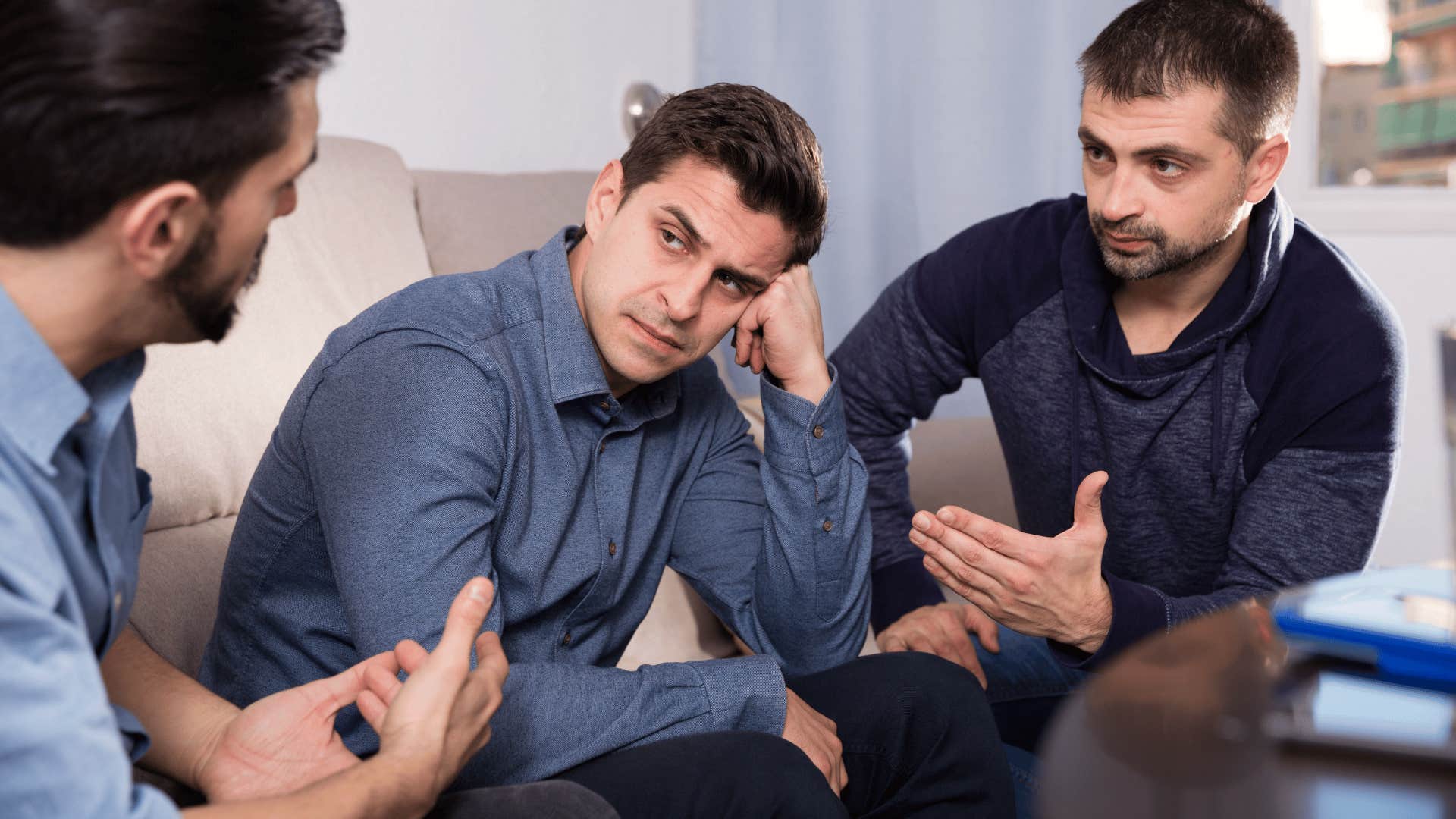 group of losers deep in discussion