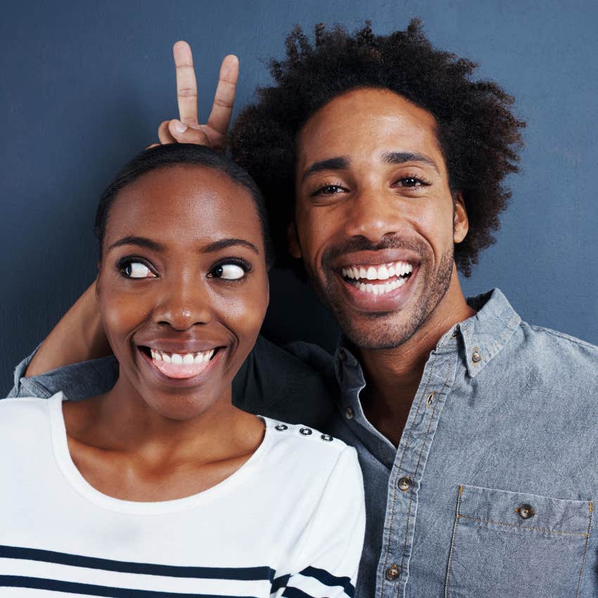 Man and woman being silly because they're best friends forever