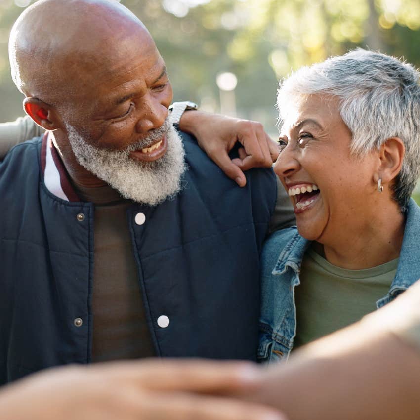 man investing in community talking to his neighbor outside