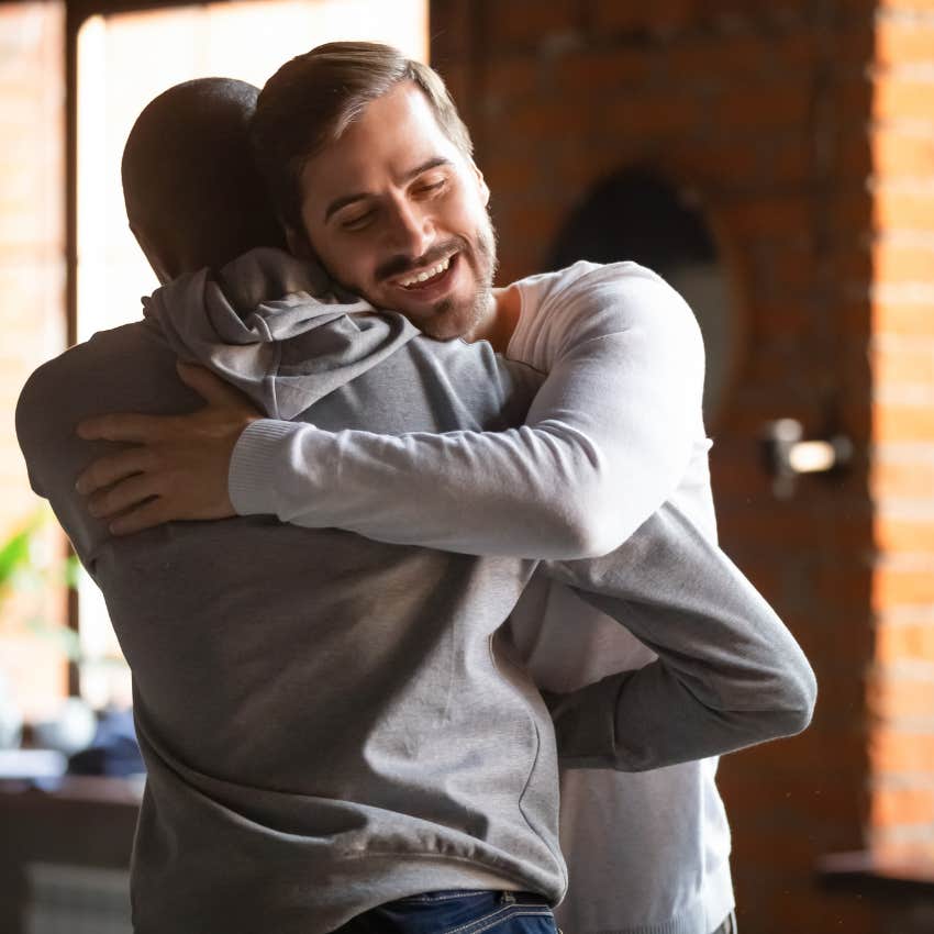 man greeting friend with hug respecting his time