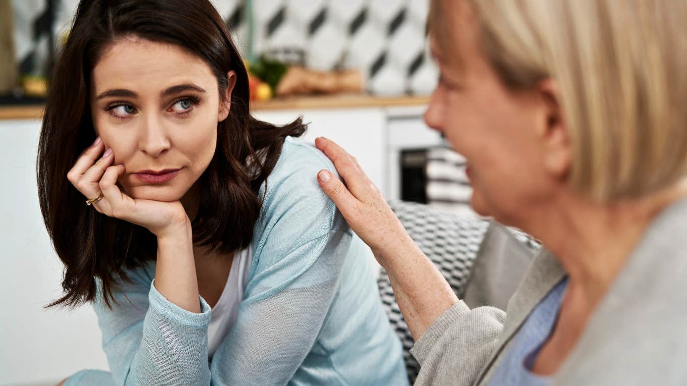 Woman who wants another woman to think she's listening but looks dubious