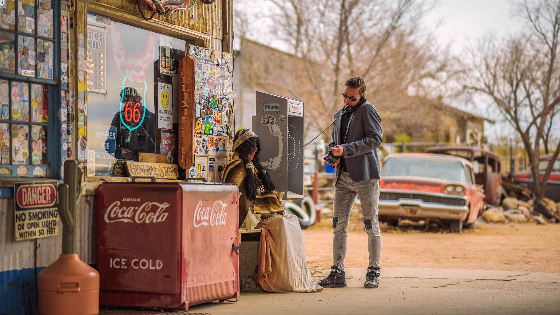 man going inside gas station to purchase drinks and snacks
