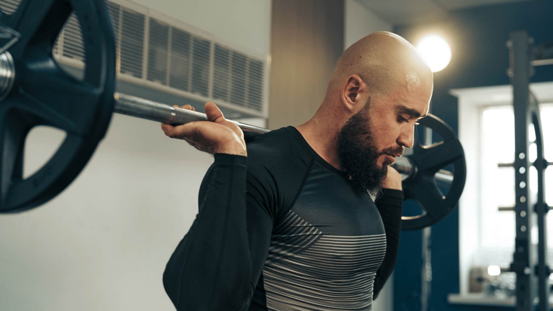 man exercising on his bench press