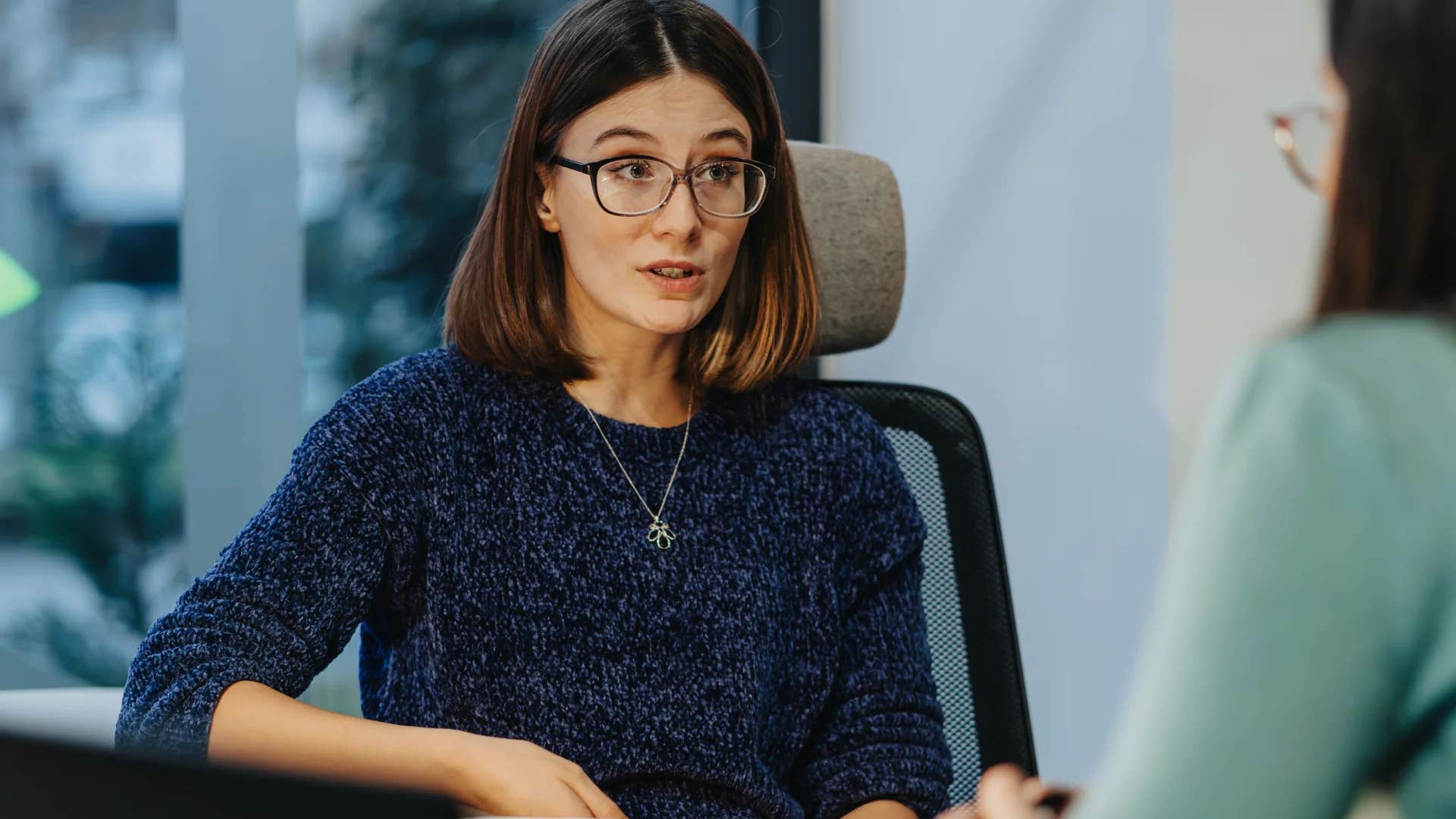 woman feeling offended by colleague saying it's not that serious