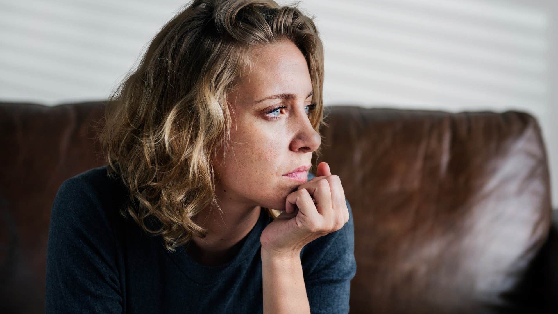woman glamorizing avoidance staring off into space